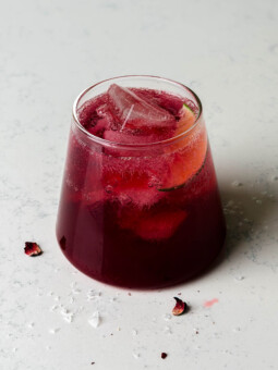 cherry hibiscus refresher in a glass cup